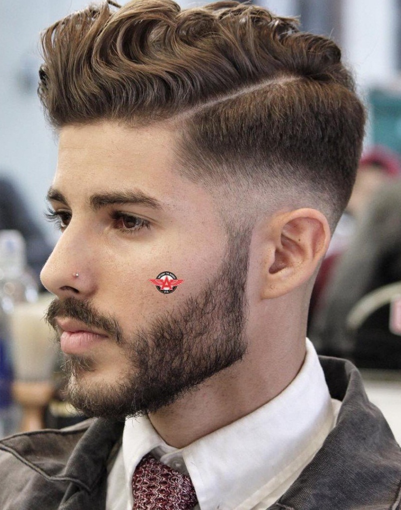 Low Fade Hard Part Wavy Pomp